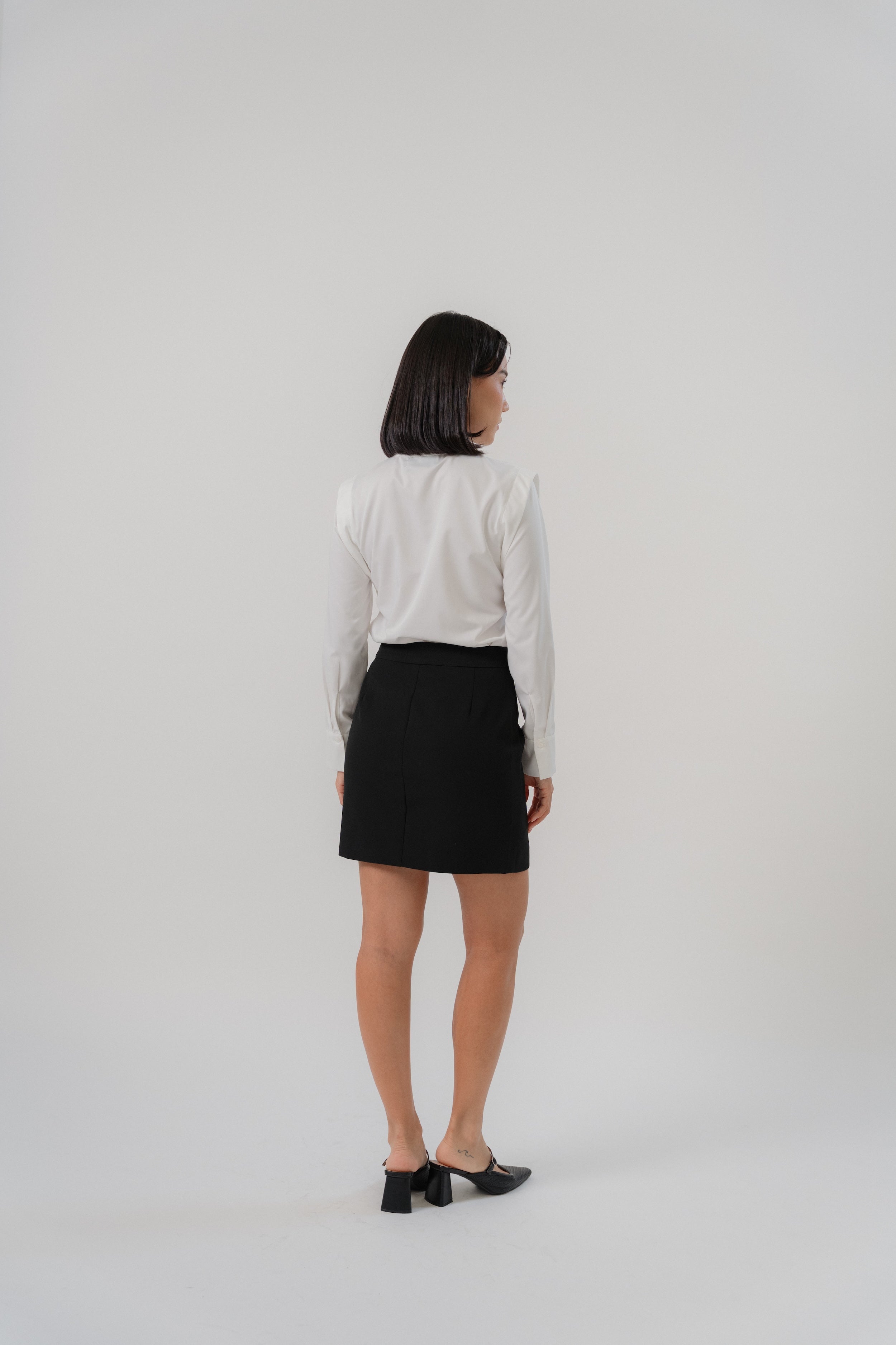wide shoulder blouse and mini pencil skirt