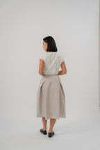 capsleeve blouse and crossing pleated skirt