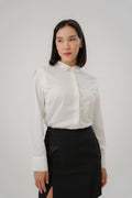women wearing a white collared wide shoulder blouse with regular fit, design for office wear