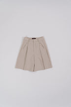 beige bermuda pants lay flat