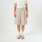 women beige bermuda pants with front pleats and pocket