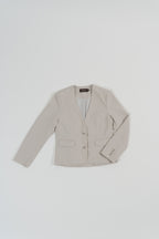 beige tailored blazer with modern silhouette, design for office and city wear