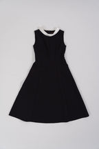 black sleeveless maxi dress with white boat neck collar design, perfect for office wear