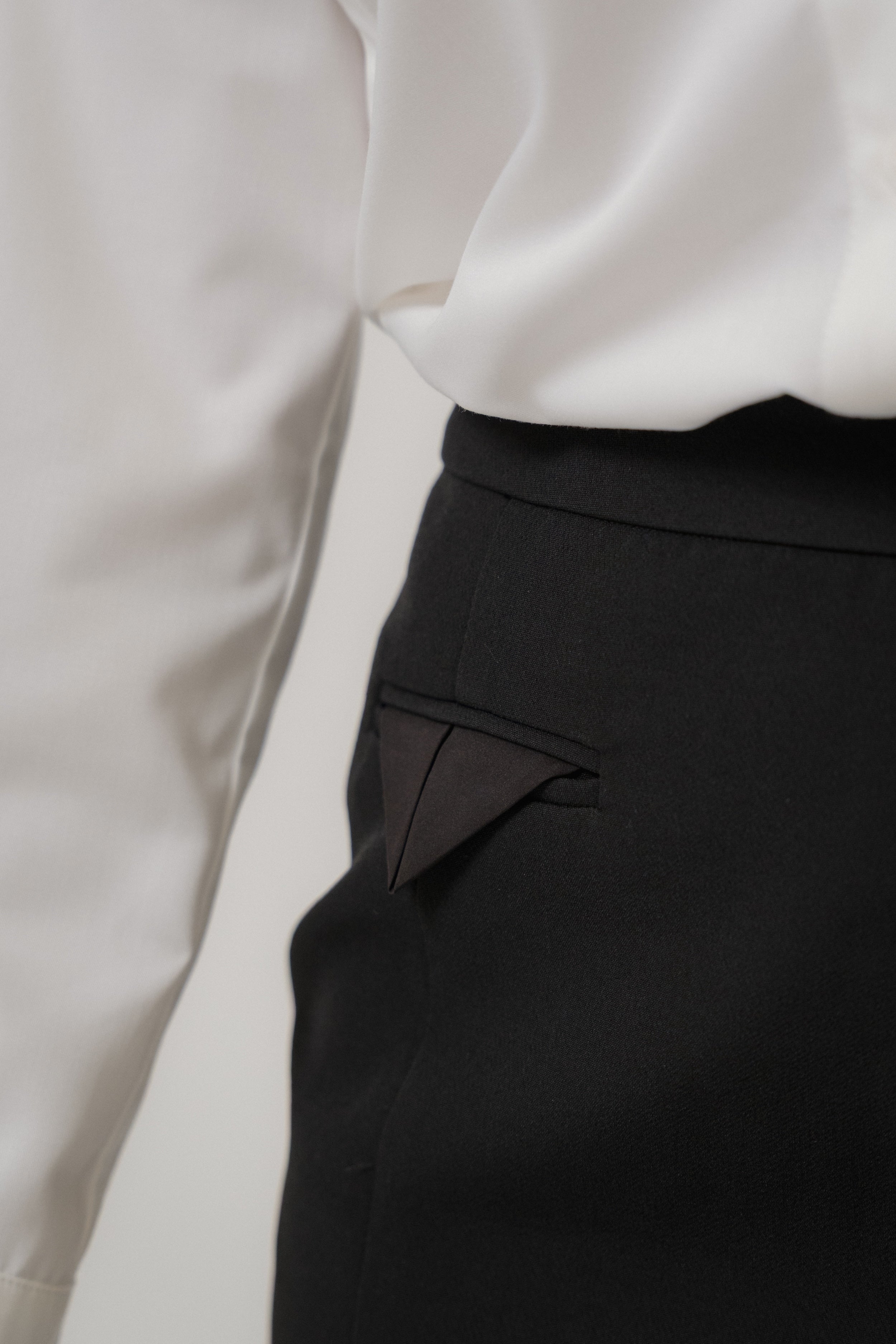 black mini pencil skirt with pocket flat detail, fit style, design for women office and city wear