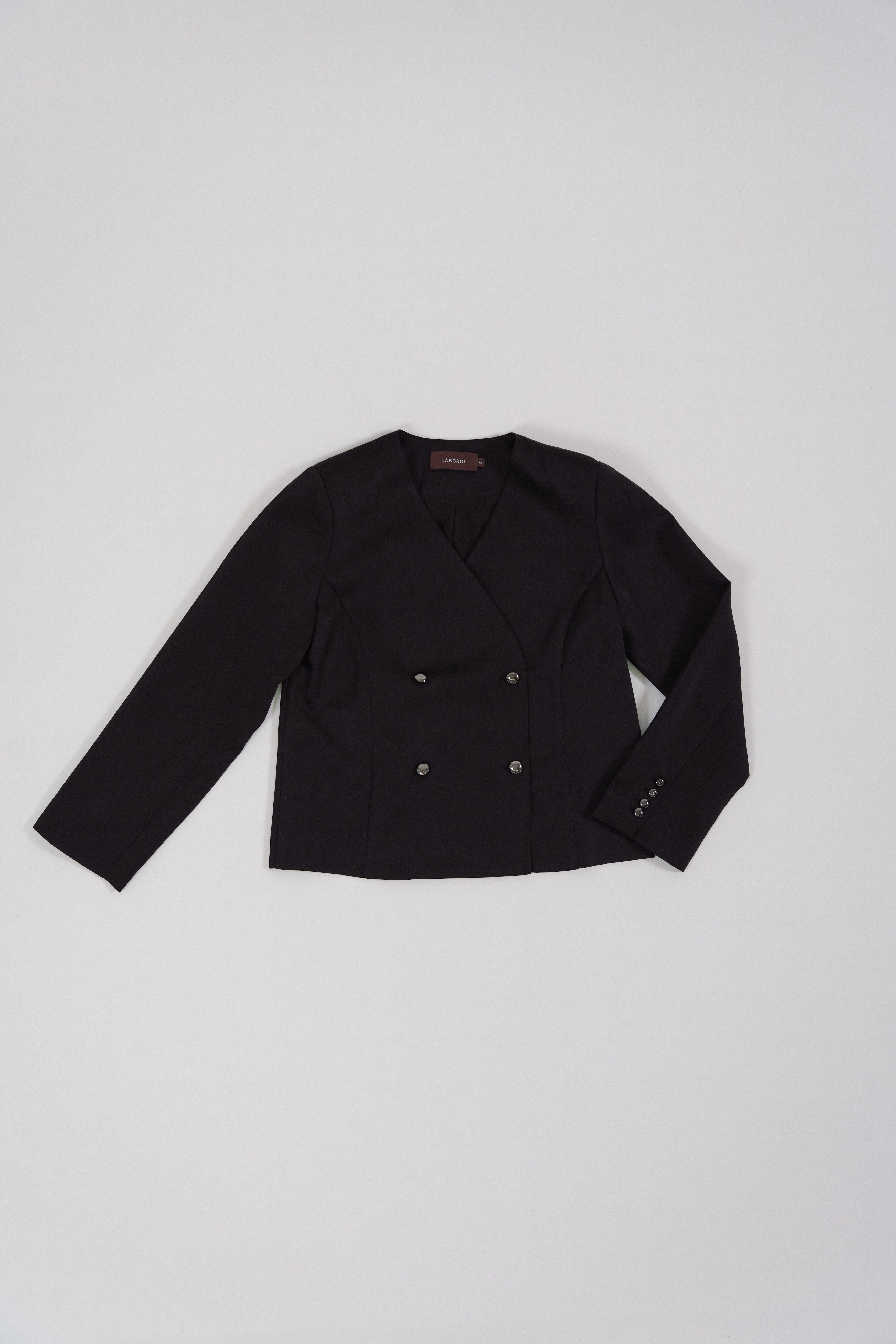 Black tailored blazer for women with a modern silhouette, designed for office and city wear.