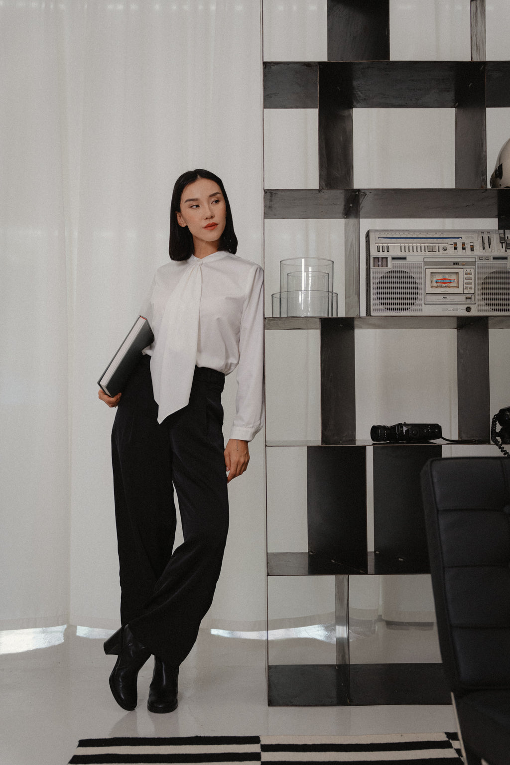 white round neck collar tie blouse and black satin pants design for office and city wear