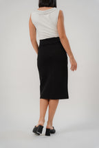 black straight slim skirt with wide waistband, large pleat, pocket square details, design for office and city wear.