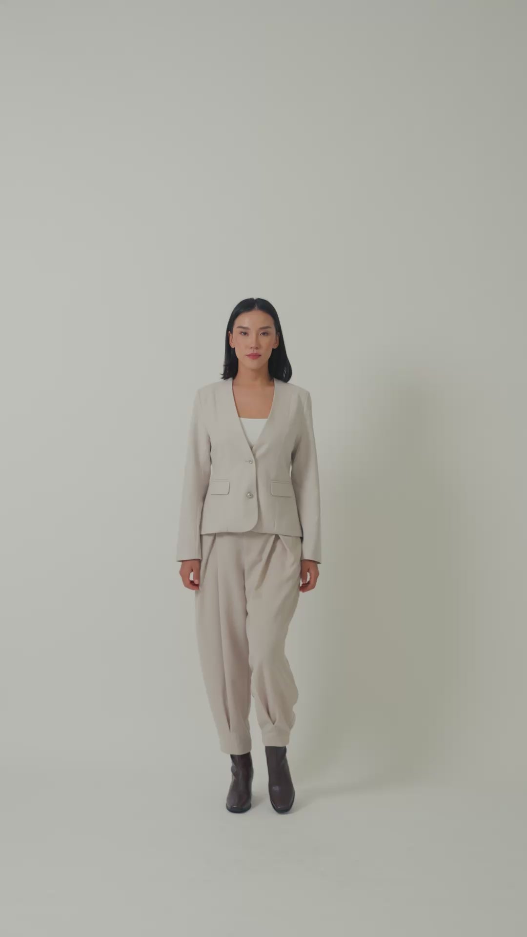 Laborio beige blazer and cross pleated pants