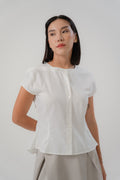 women wearing white capsleeve blouse with regular fit, back flare, timeless design, perfect for office and daily wear