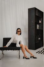 women wearing round neck collar tie blouse with classic blouse silhouette, design for office and city wear