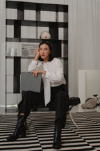 women wearing round neck collar tie blouse with classic blouse silhouette, design for office and city wear