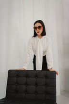 women wearing round neck collar tie blouse with classic blouse silhouette, design for office and city wear.