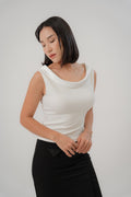 white sleeveless top with boat neckline in satin, comfortable fit, designed for women's office and city wear.